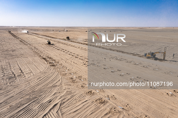 In Jiuquan, China, on March 18, 2024, an aerial photo shows the Jinta Zhongguang Solar 100,000kw solar thermal + 600,000kW photovoltaic proj...