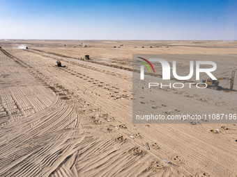 In Jiuquan, China, on March 18, 2024, an aerial photo shows the Jinta Zhongguang Solar 100,000kw solar thermal + 600,000kW photovoltaic proj...