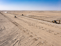 In Jiuquan, China, on March 18, 2024, an aerial photo shows the Jinta Zhongguang Solar 100,000kw solar thermal + 600,000kW photovoltaic proj...