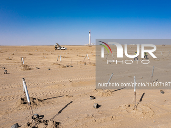 In Jiuquan, China, on March 18, 2024, an aerial photo shows the Jinta Zhongguang Solar 100,000kw solar thermal + 600,000kW photovoltaic proj...