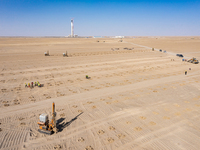 In Jiuquan, China, on March 18, 2024, an aerial photo shows the Jinta Zhongguang Solar 100,000kw solar thermal + 600,000kW photovoltaic proj...