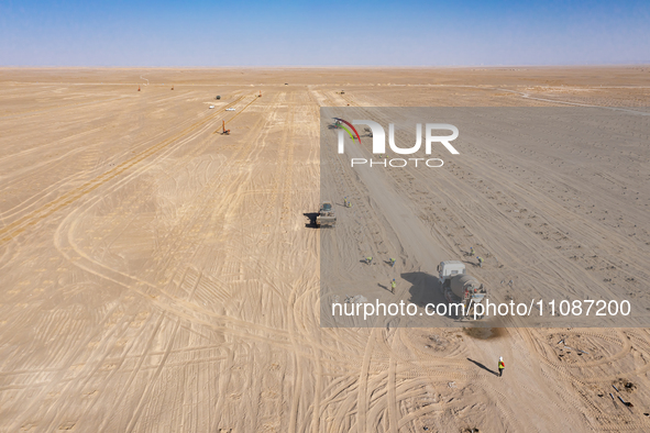 In Jiuquan, China, on March 18, 2024, an aerial photo shows the Jinta Zhongguang Solar 100,000kw solar thermal + 600,000kW photovoltaic proj...