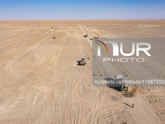 In Jiuquan, China, on March 18, 2024, an aerial photo shows the Jinta Zhongguang Solar 100,000kw solar thermal + 600,000kW photovoltaic proj...