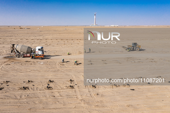 In Jiuquan, China, on March 18, 2024, an aerial photo shows the Jinta Zhongguang Solar 100,000kw solar thermal + 600,000kW photovoltaic proj...