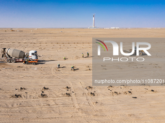 In Jiuquan, China, on March 18, 2024, an aerial photo shows the Jinta Zhongguang Solar 100,000kw solar thermal + 600,000kW photovoltaic proj...