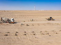 In Jiuquan, China, on March 18, 2024, an aerial photo shows the Jinta Zhongguang Solar 100,000kw solar thermal + 600,000kW photovoltaic proj...