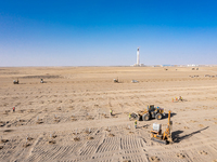 In Jiuquan, China, on March 18, 2024, an aerial photo shows the Jinta Zhongguang Solar 100,000kw solar thermal + 600,000kW photovoltaic proj...