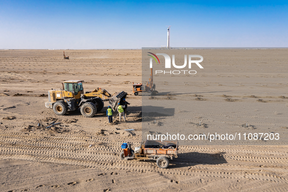 In Jiuquan, China, on March 18, 2024, an aerial photo shows the Jinta Zhongguang Solar 100,000kw solar thermal + 600,000kW photovoltaic proj...