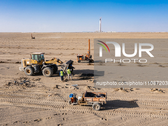 In Jiuquan, China, on March 18, 2024, an aerial photo shows the Jinta Zhongguang Solar 100,000kw solar thermal + 600,000kW photovoltaic proj...