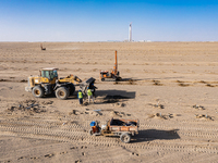 In Jiuquan, China, on March 18, 2024, an aerial photo shows the Jinta Zhongguang Solar 100,000kw solar thermal + 600,000kW photovoltaic proj...