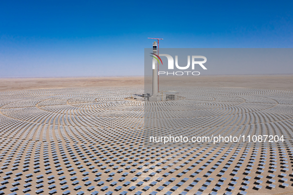 In Jiuquan, China, on March 18, 2024, an aerial photo shows the Jinta Zhongguang Solar 100,000kw solar thermal + 600,000kW photovoltaic proj...