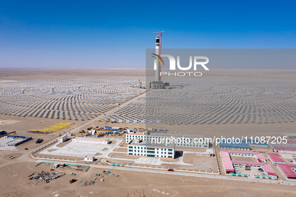 In Jiuquan, China, on March 18, 2024, an aerial photo shows the Jinta Zhongguang Solar 100,000kw solar thermal + 600,000kW photovoltaic proj...