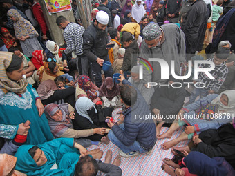 People are gathering to receive leech therapy on the occasion of Nowruz, the beginning of the year in the Persian calendar, in Srinagar, Kas...