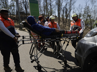 Members of Civil Protection are rescuing a person who suffered a fall while climbing Cerro de la Estrella in the Iztapalapa mayor's office i...