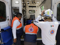 Members of Civil Protection are rescuing a person who suffered a fall while climbing Cerro de la Estrella in the Iztapalapa mayor's office i...