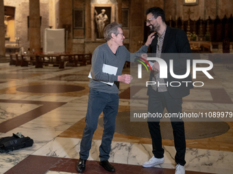 Poet Gabriele Tinti and actor Willem Dafoe are reading the poems by Gabriele Tinti at The Pantheon in Rome, Italy, on March 21, 2024. (