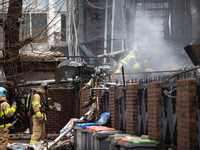 Firefighters are extinguishing a fire that has broken out at the commercial complex of Yeouido Gongjak Apartments in Seoul, South Korea, on...