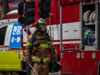 Firefighters are extinguishing a fire that has broken out at the commercial complex of Yeouido Gongjak Apartments in Seoul, South Korea, on...