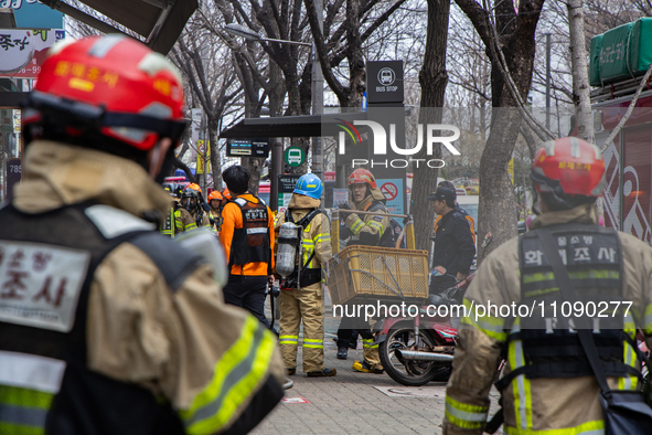 Firefighters are extinguishing a fire that has broken out at the commercial complex of Yeouido Gongjak Apartments in Seoul, South Korea, on...