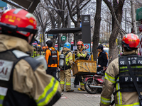 Firefighters are extinguishing a fire that has broken out at the commercial complex of Yeouido Gongjak Apartments in Seoul, South Korea, on...