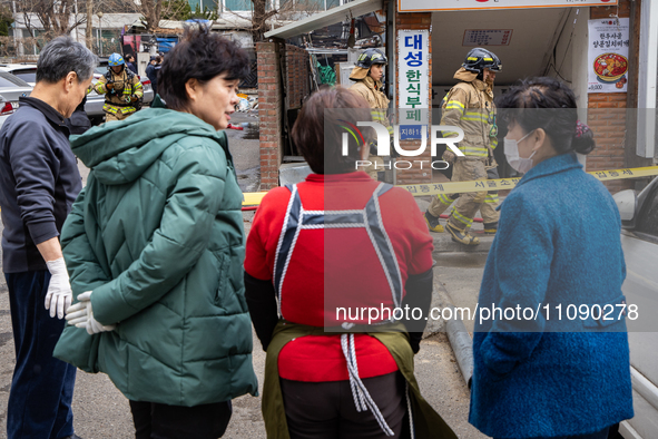 Firefighters are extinguishing a fire that has broken out at the commercial complex of Yeouido Gongjak Apartments in Seoul, South Korea, on...