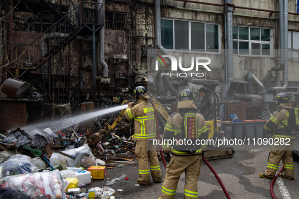 Firefighters are extinguishing a fire that has broken out at the commercial complex of Yeouido Gongjak Apartments in Seoul, South Korea, on...