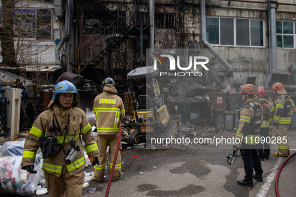 Firefighters are extinguishing a fire that has broken out at the commercial complex of Yeouido Gongjak Apartments in Seoul, South Korea, on...