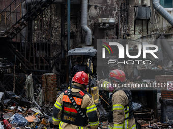 Firefighters are extinguishing a fire that has broken out at the commercial complex of Yeouido Gongjak Apartments in Seoul, South Korea, on...