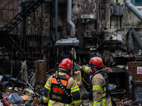 Firefighters are extinguishing a fire that has broken out at the commercial complex of Yeouido Gongjak Apartments in Seoul, South Korea, on...