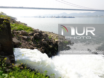 Purified water from the sewage treatment plant is meeting the standards and is being discharged into the Yangtze River in Yichang, Hubei, Ch...