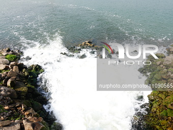 Purified water from the sewage treatment plant is meeting the standards and is being discharged into the Yangtze River in Yichang, Hubei, Ch...