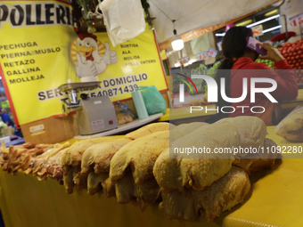 Chickens are for sale at a market in Mexico City. Recently, the Ministry of Health of Tlaxcala, Mexico, issued an epidemiological alert due...