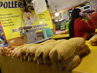 Chickens are for sale at a market in Mexico City. Recently, the Ministry of Health of Tlaxcala, Mexico, issued an epidemiological alert due...