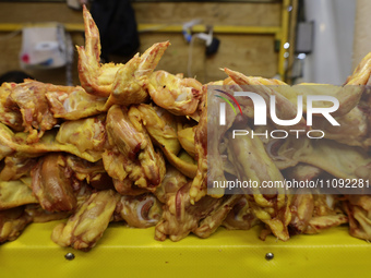 Chickens are for sale at a market in Mexico City. Recently, the Ministry of Health of Tlaxcala, Mexico, issued an epidemiological alert due...