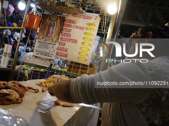 A woman is cutting chicken into pieces for sale at a market in Mexico City. Recently, the Ministry of Health of Tlaxcala in Mexico issued an...