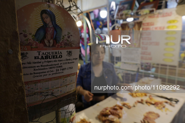 A woman is cutting chicken into pieces for sale at a market in Mexico City. Recently, the Ministry of Health of Tlaxcala in Mexico issued an...