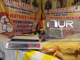 Chickens are for sale at a market in Mexico City. Recently, the Ministry of Health of Tlaxcala, Mexico, issued an epidemiological alert due...