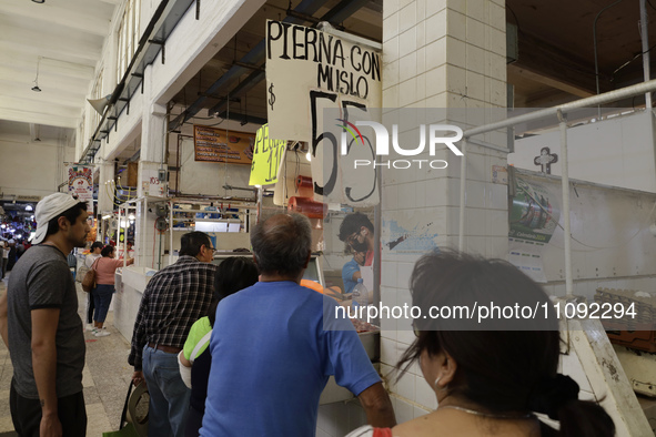 Chickens are for sale at a market in Mexico City. Recently, the Ministry of Health of Tlaxcala, Mexico, issued an epidemiological alert due...