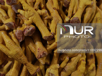 Chickens are for sale at a market in Mexico City. Recently, the Ministry of Health of Tlaxcala, Mexico, issued an epidemiological alert due...