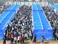 College graduates are attending a job fair in Qingdao, Shandong Province, China, on March 23, 2024. (