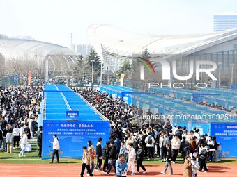 College graduates are attending a job fair in Qingdao, Shandong Province, China, on March 23, 2024. (