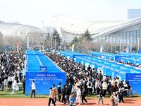 College graduates are attending a job fair in Qingdao, Shandong Province, China, on March 23, 2024. (