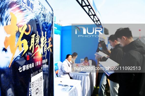 College graduates are attending a job fair in Qingdao, Shandong Province, China, on March 23, 2024. 