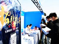 College graduates are attending a job fair in Qingdao, Shandong Province, China, on March 23, 2024. (