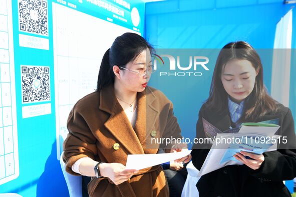 College graduates are attending a job fair in Qingdao, Shandong Province, China, on March 23, 2024. 