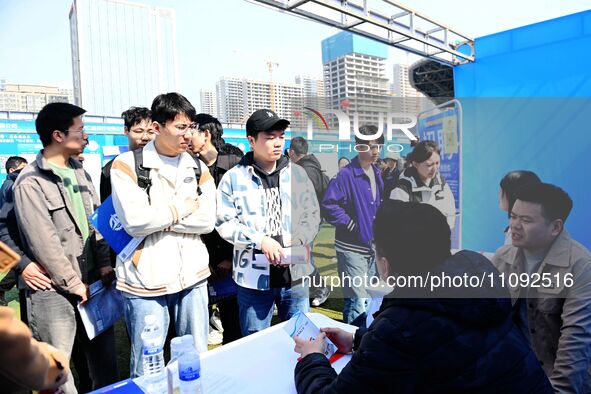 College graduates are attending a job fair in Qingdao, Shandong Province, China, on March 23, 2024. 