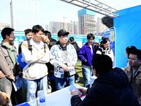 College graduates are attending a job fair in Qingdao, Shandong Province, China, on March 23, 2024. (