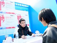 College graduates are attending a job fair in Qingdao, Shandong Province, China, on March 23, 2024. (