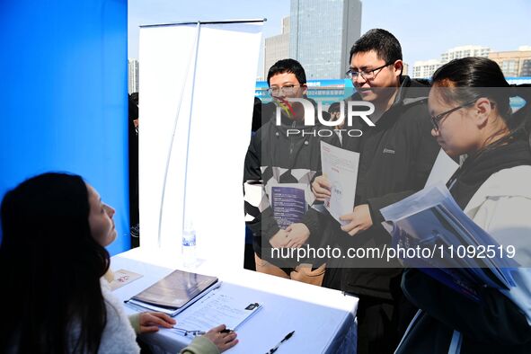 College graduates are attending a job fair in Qingdao, Shandong Province, China, on March 23, 2024. 