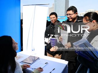 College graduates are attending a job fair in Qingdao, Shandong Province, China, on March 23, 2024. (